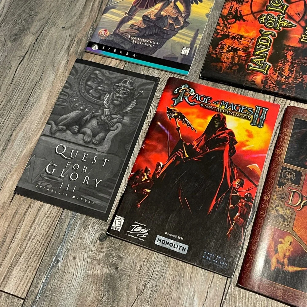 16 PC Game Manual Lot Might and Magic Quest for Glory Fable Dungeons & Dragons